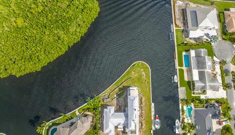 View of a waterfront home under construction, seen from above