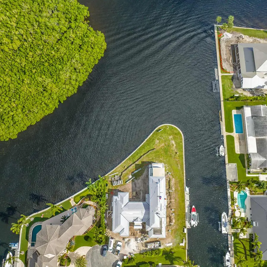 View of a waterfront home under construction, seen from above