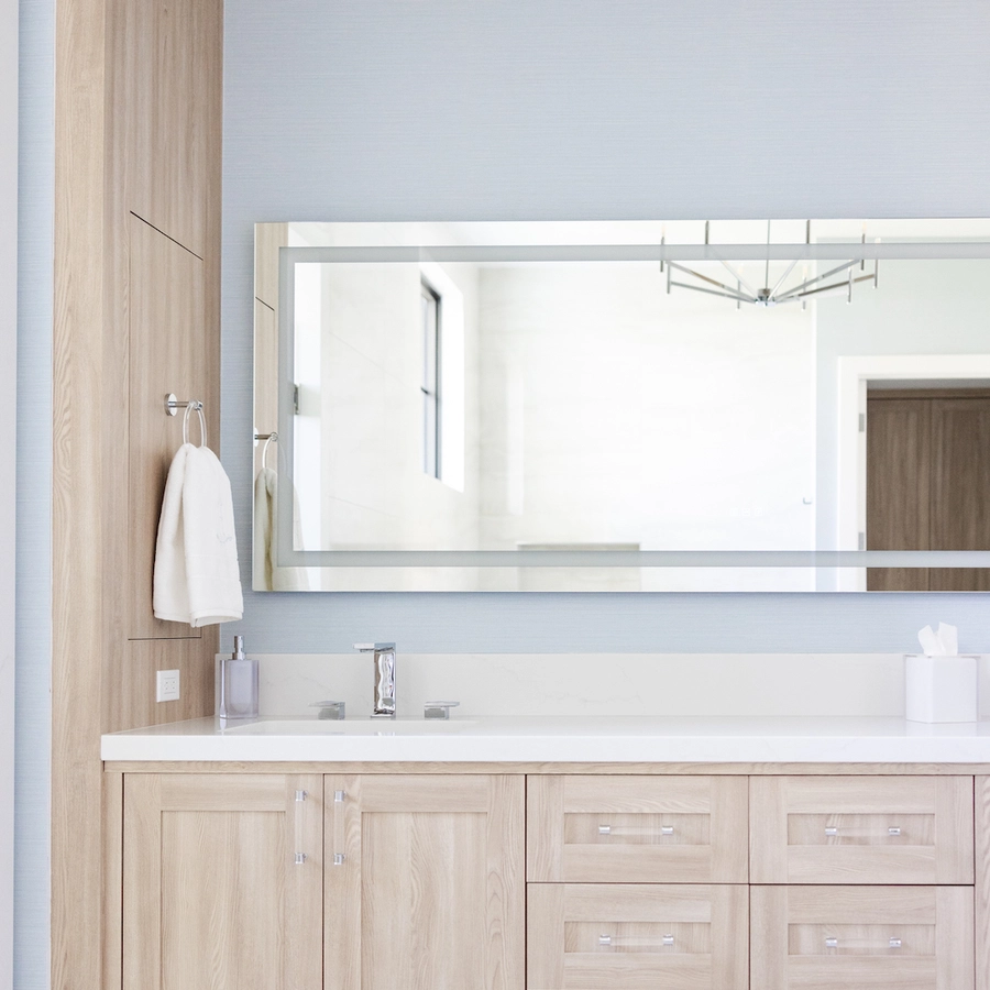 custom built in vanity with hidden medicine cabinet