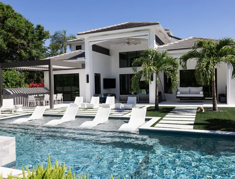 Luxury backyard with pool and seating area