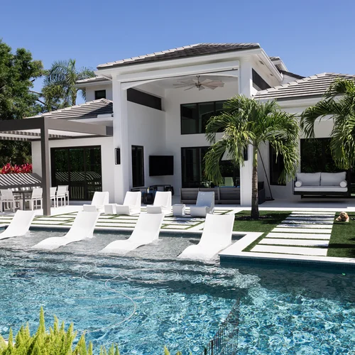 Luxury backyard with pool and seating area