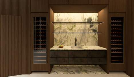 pool overlooking the ocean in lite up the night