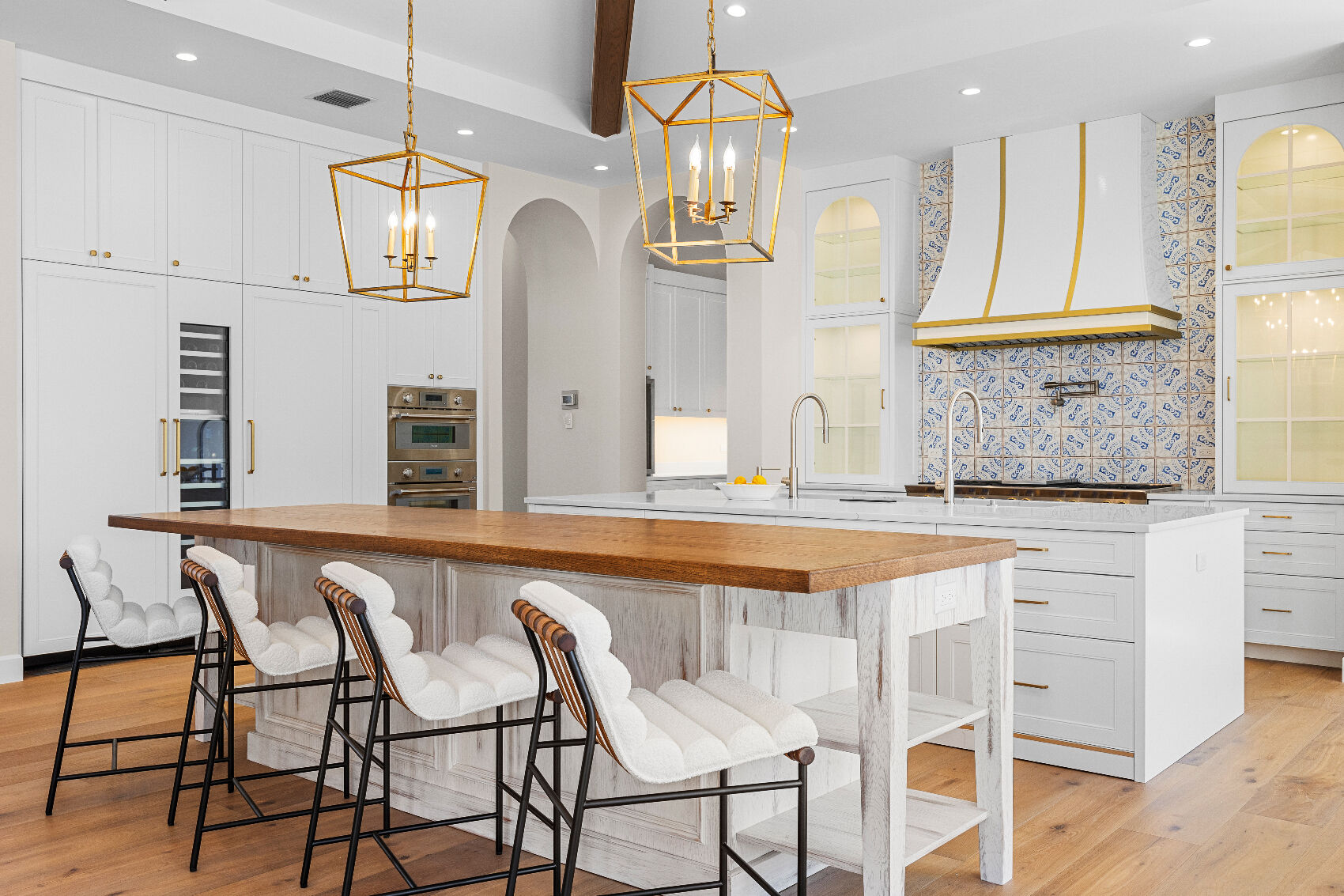 large kitchen with prominent bar/ island