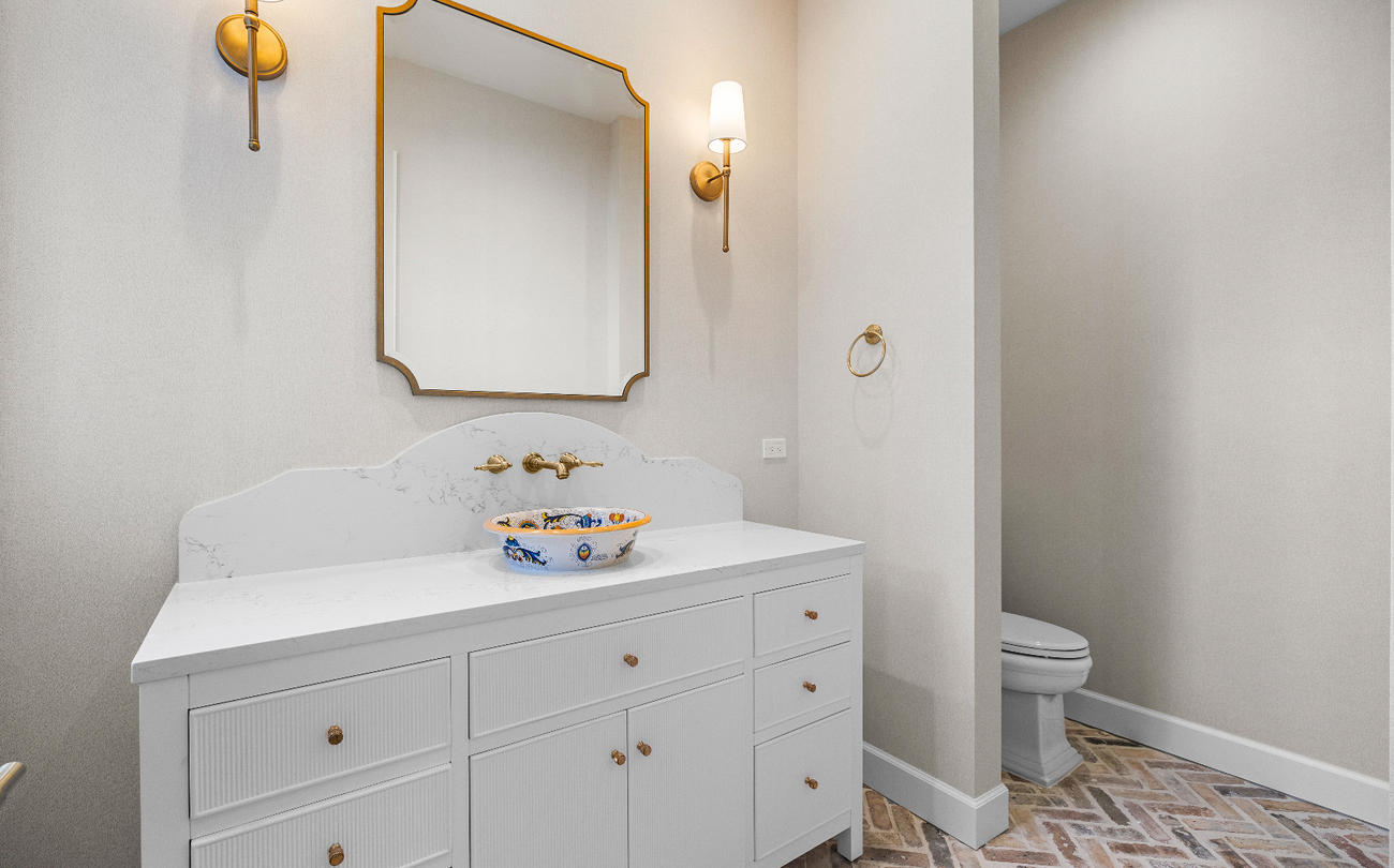 large guest bathroom with hand-painted sink basin