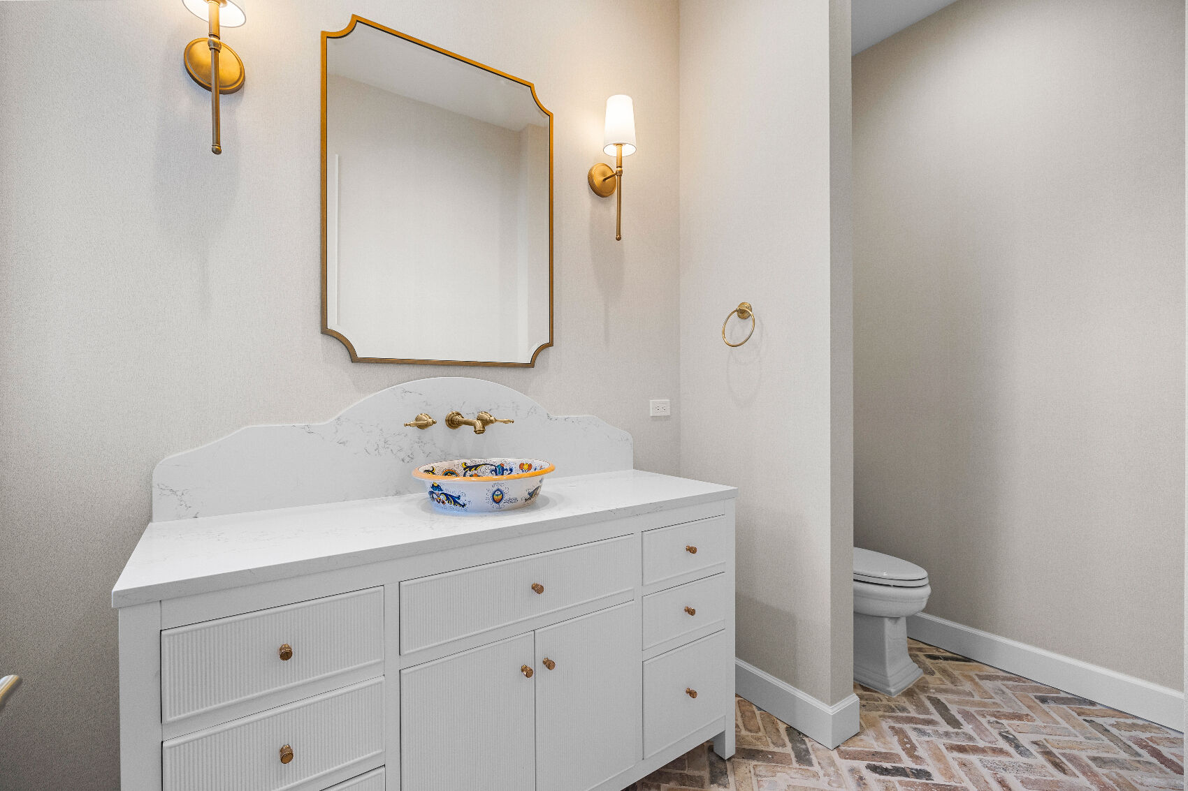 large guest bathroom with hand-painted sink basin