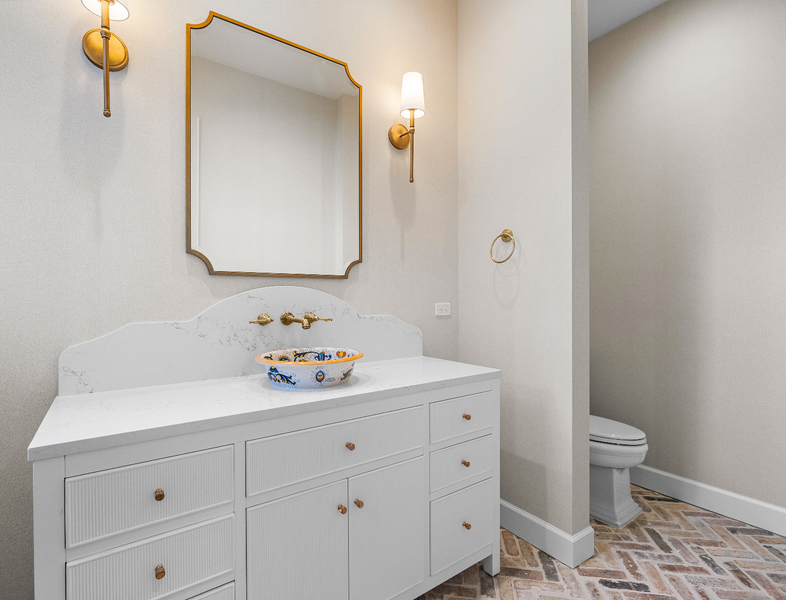 large guest bathroom with hand-painted sink basin