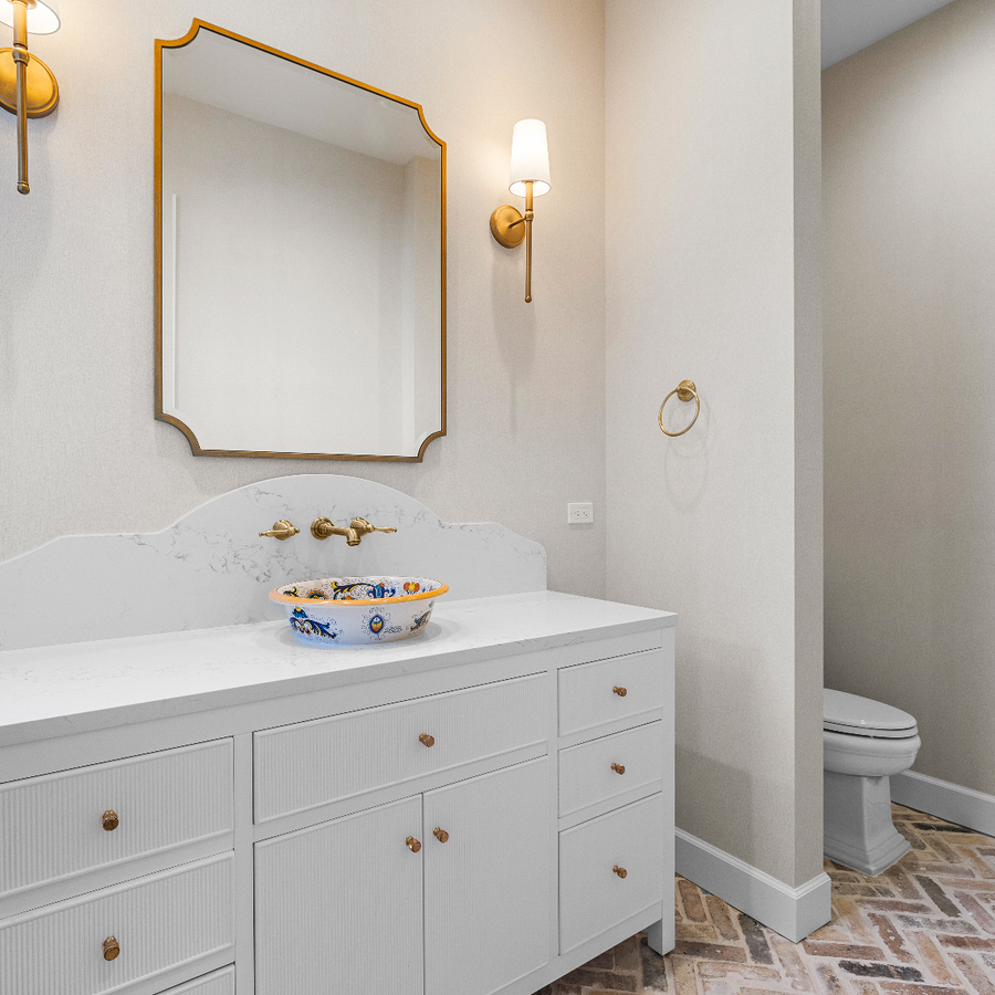 large guest bathroom with hand-painted sink basin