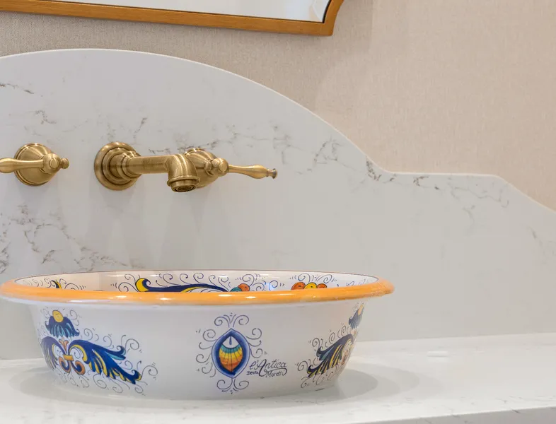 large guest bathroom with hand-painted sink basin
