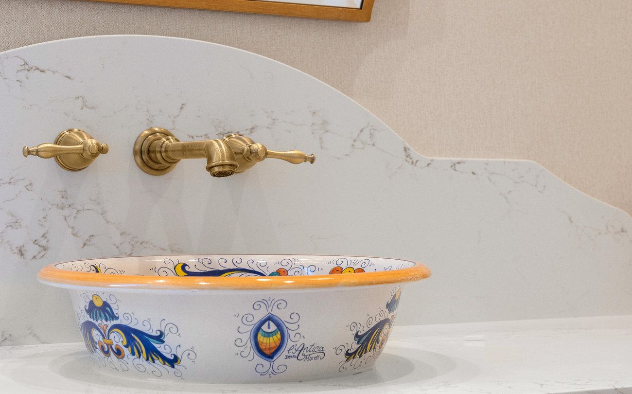 large guest bathroom with hand-painted sink basin