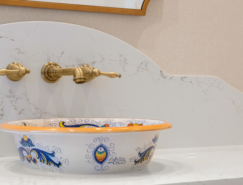 large guest bathroom with hand-painted sink basin