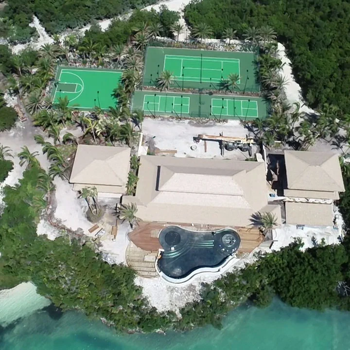 A bird's eye view of the private island retreat, with its three tennis courts and basketball court