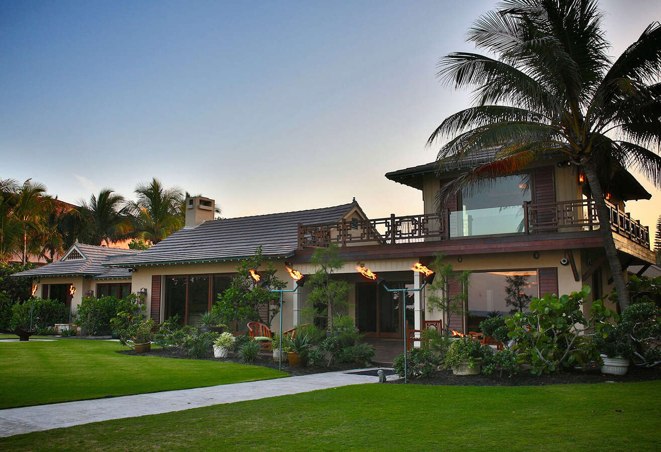 beautiful look at a palm beach home at sundown