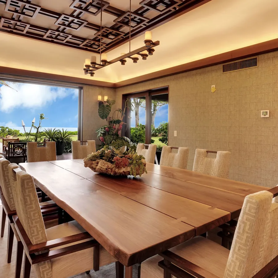 large dinner table overlooking the oceanfront property