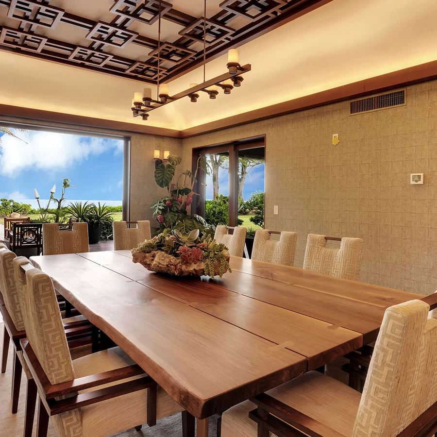 large dinner table overlooking the oceanfront property